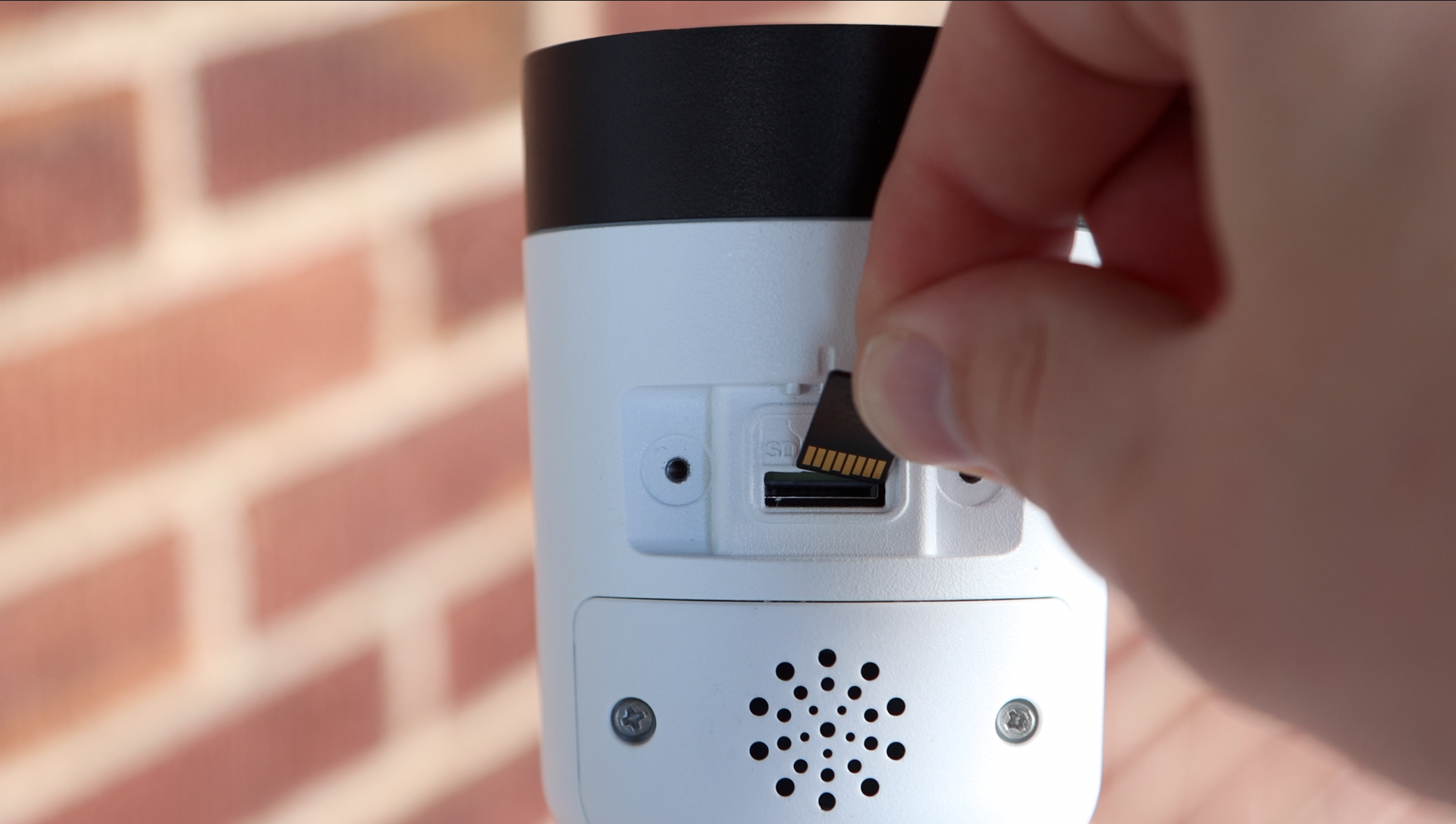 inserting SD card into security camera
